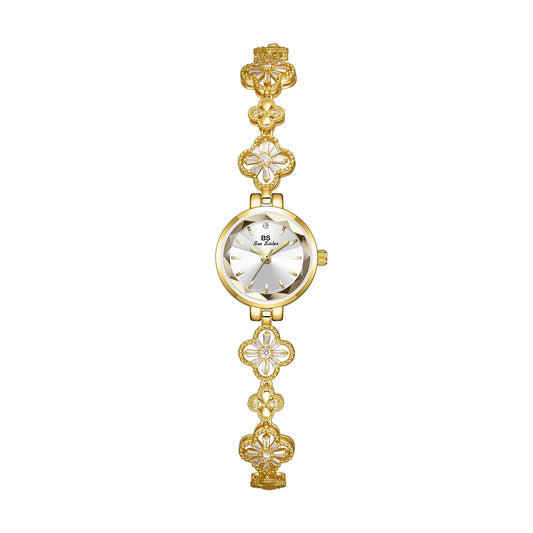 Montre dorée fleurie à cadran cristal taillé