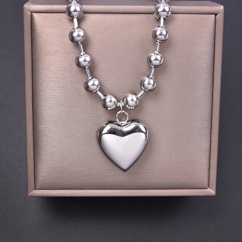 Collier boule argenté avec pendentif cœur