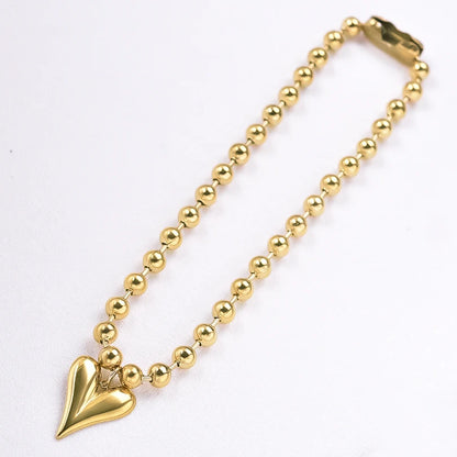 Collier boule argenté avec pendentif cœur