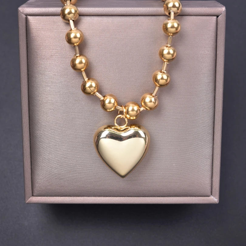 Collier boule argenté avec pendentif cœur