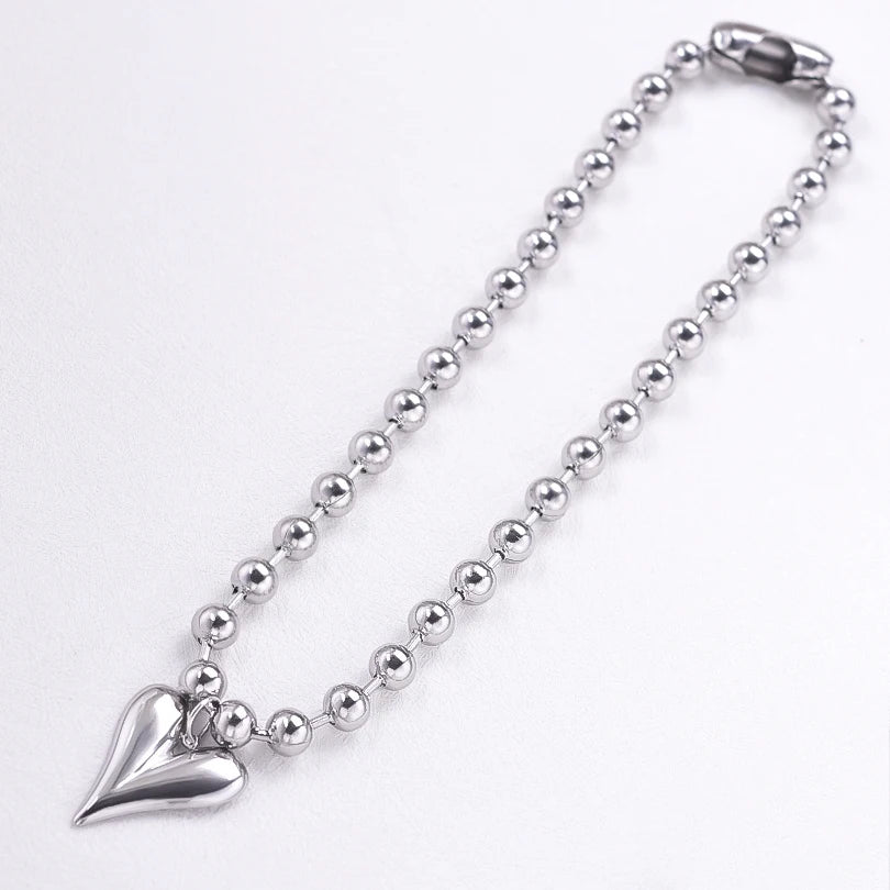 Collier boule argenté avec pendentif cœur