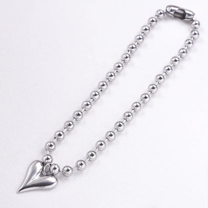 Collier boule argenté avec pendentif cœur