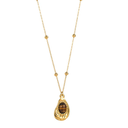 Collier doré médaillon œil de tigre vintage