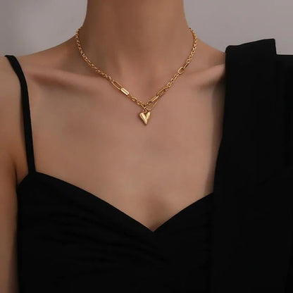Collier double chaîne dorée avec anneau argenté