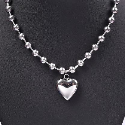 Collier boule argenté avec pendentif cœur